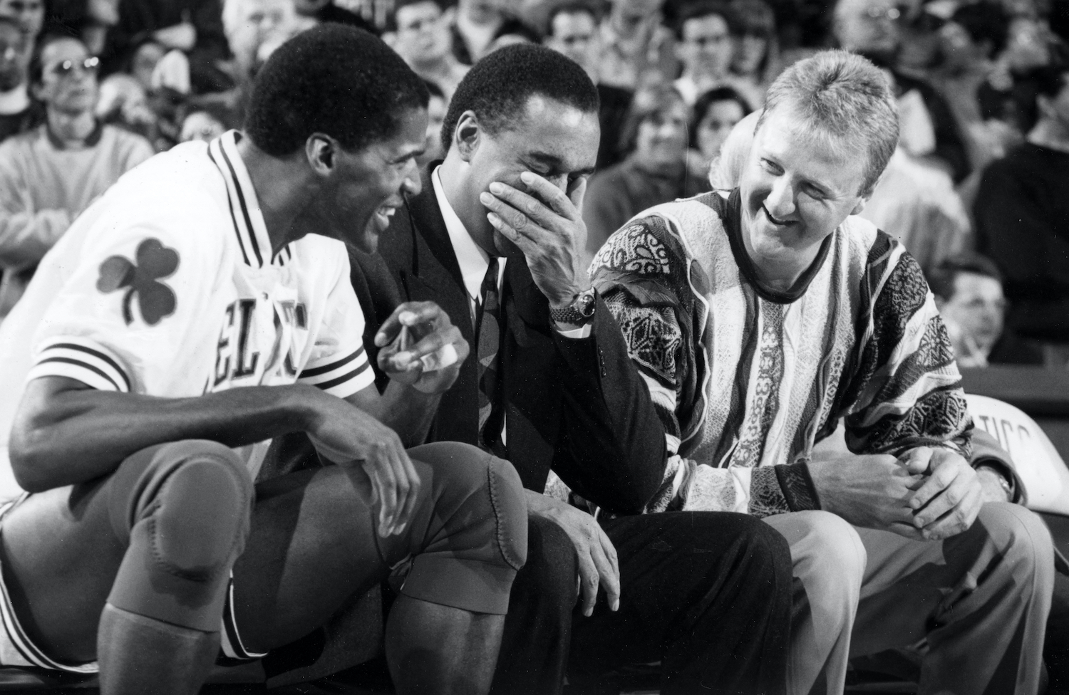 Robert Parish (L), Dennis Johnson (center), and Larry Bird (R) together on the Boston Celtics bench.