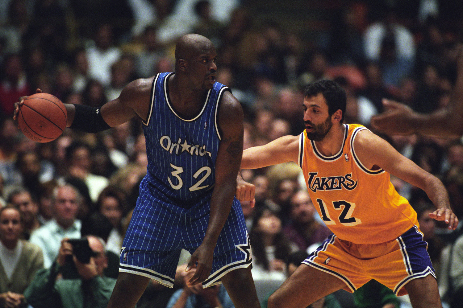 A young Shaquille O'Neal in action as a member of the Orlando Magic.