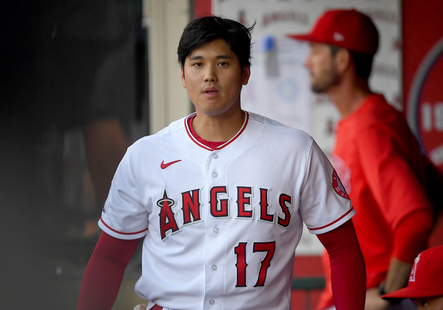 Shohei Ohtani of the Los Angeles Angels in the dugout during the game against the Seattle Mariners at Angel Stadium of Anaheim on July 16, 2021. | Jayne Kamin-Oncea/Getty Images