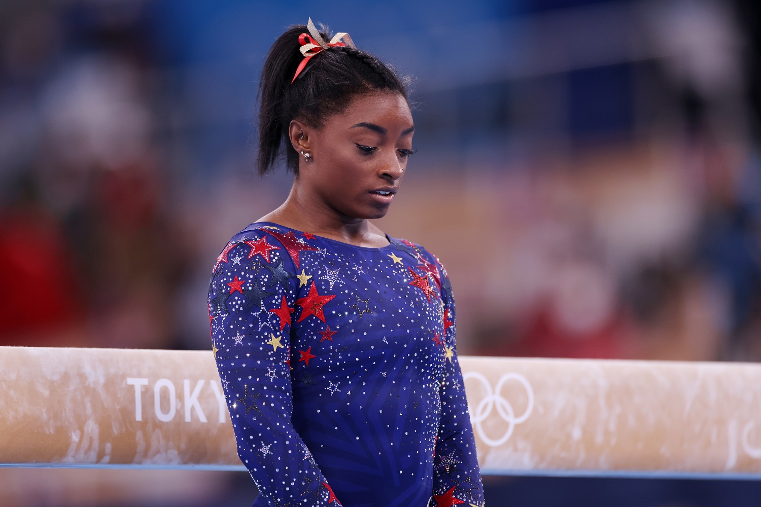 Simone Biles looks on during women's qualification on Day 2 of the Tokyo 2020 Olympic Games at Ariake Gymnastics Centre on July 25, 2021.