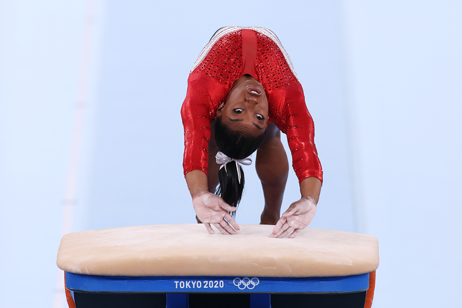 Simone Biles competes in the vault during the 2020 Olympics.