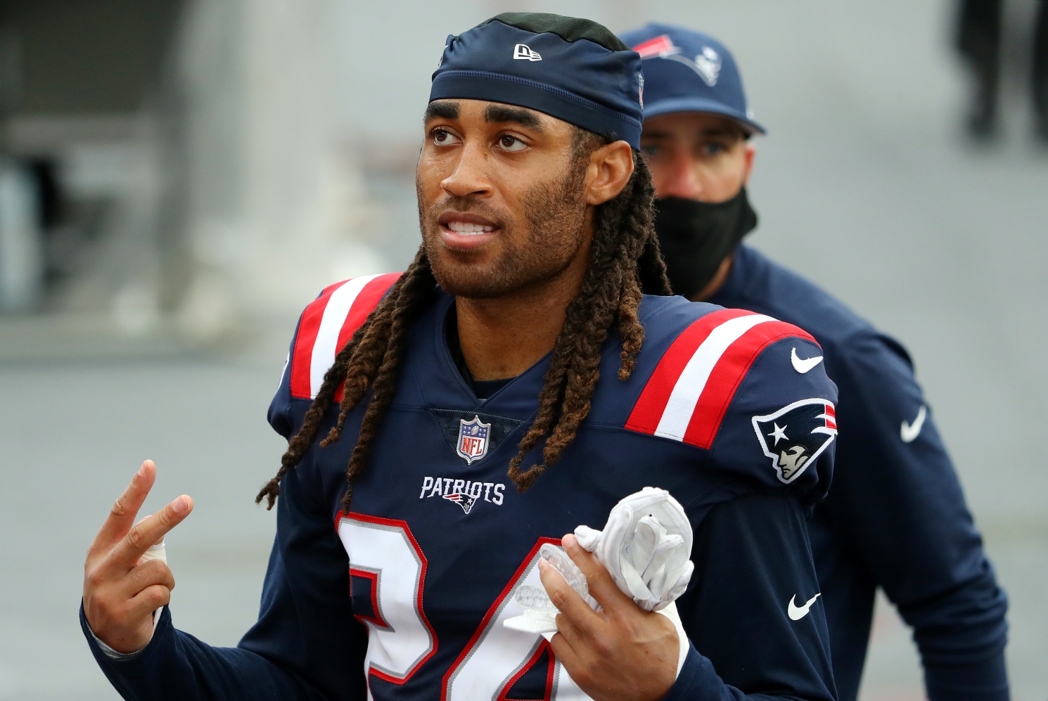 New England Patriots cornerback Stephon Gilmore signals to the crowd after a win.