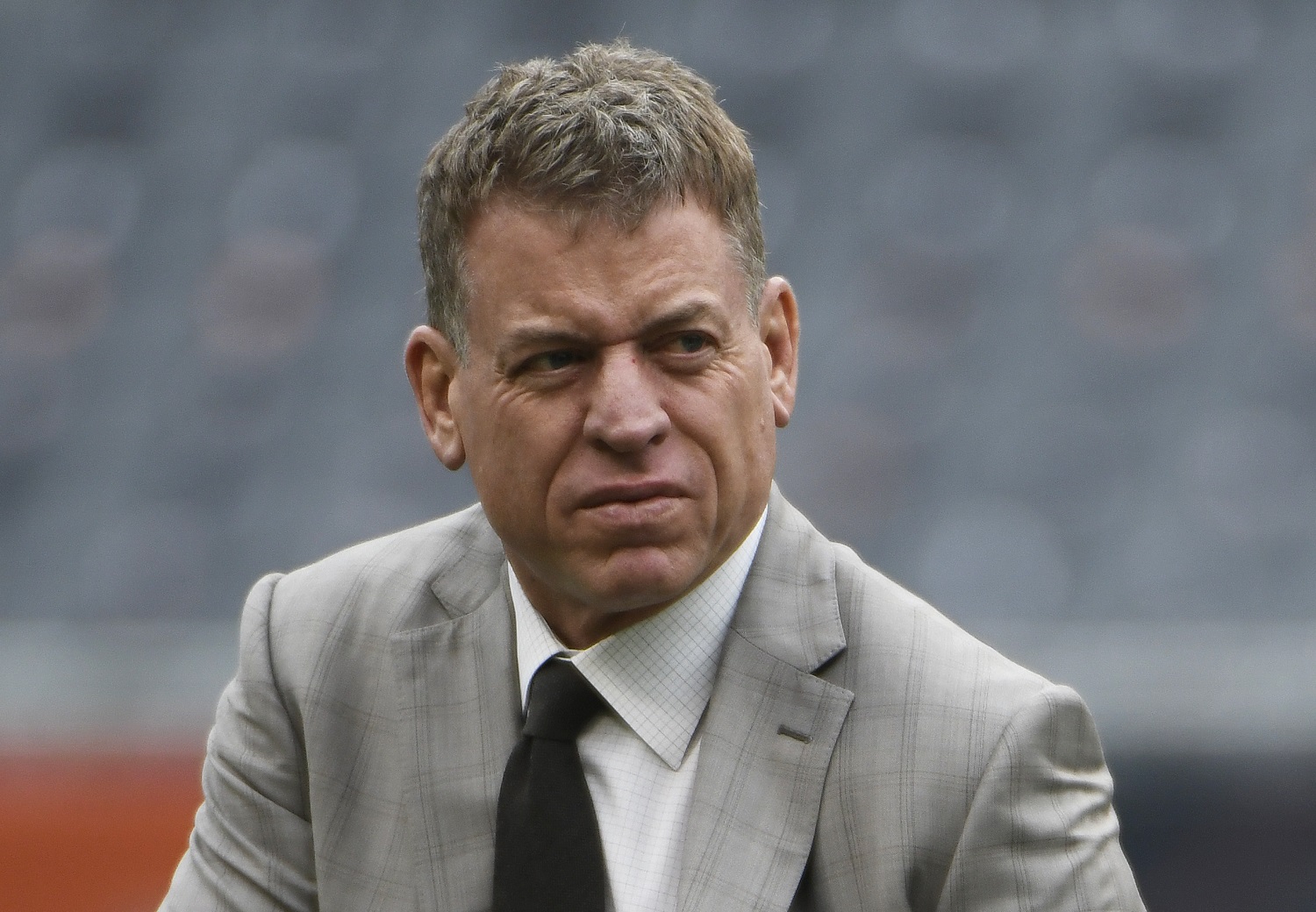 Fox Sports analyst Troy Aikman on the field before the game between the Chicago Bears and New Orleans Saints on Oct. 20, 2019.