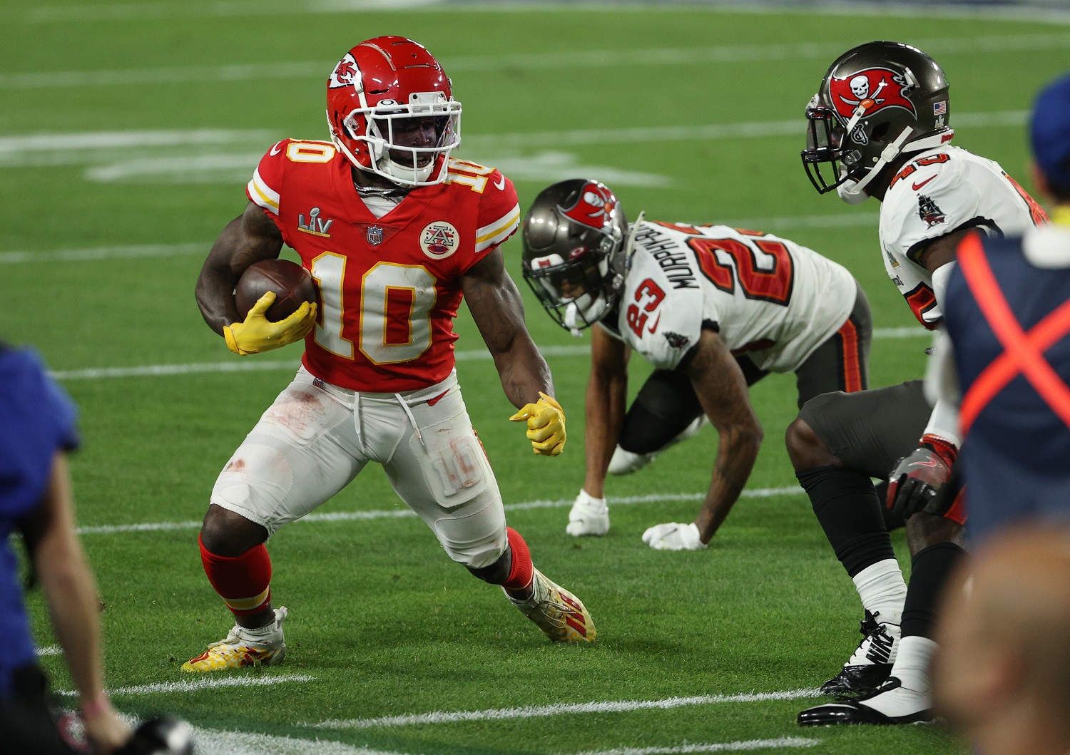 Tyreek Hill of the Kansas City Chiefs scrambles ahead of Sean Murphy-Bunting of the Tampa Bay Buccaneers in Super Bowl 55 in Tampa, Florida.