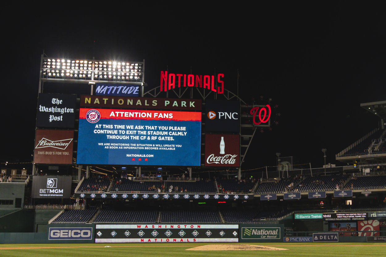 The message on the Nationals Park scoreboard alerting fans to stay in the stadium.