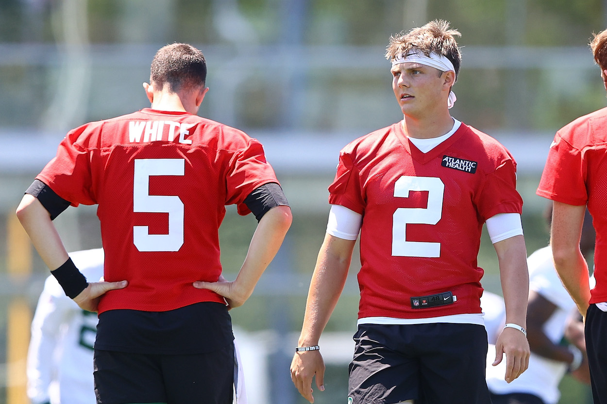 Zach Wilson of the New York Jets runs drills during New York Jets Mandatory Minicamp on June 15, 2021 at Atlantic Health Jets Training Center in Florham Park, New Jersey. The Zach Wilson contract issue could become a disaster for the Jets.