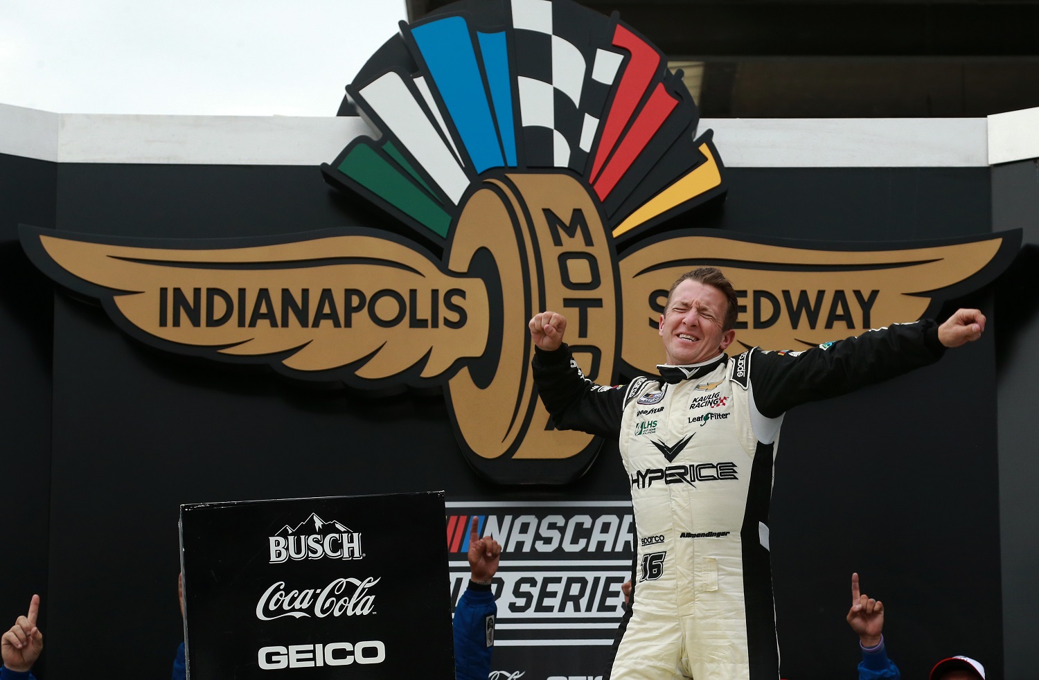 AJ Allmendinger celebrates in victory lane after winning the NASCAR Cup Series Verizon 200 at the Brickyard at Indianapolis Motor Speedway on Aug. 15, 2021, in Indianapolis, Indiana.