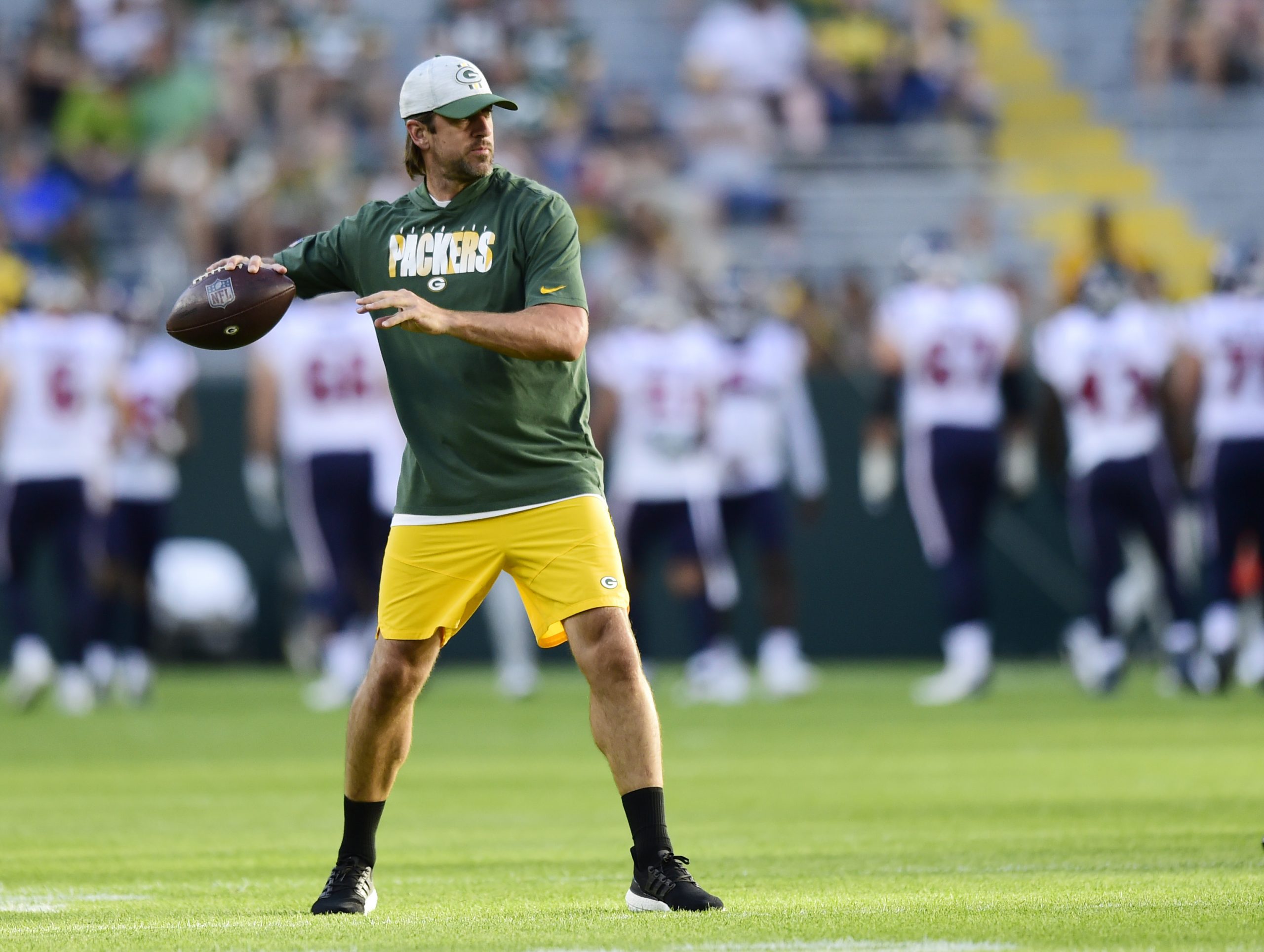 Aaron Rodgers of the Green Bay Packers throws a pass during warmups.