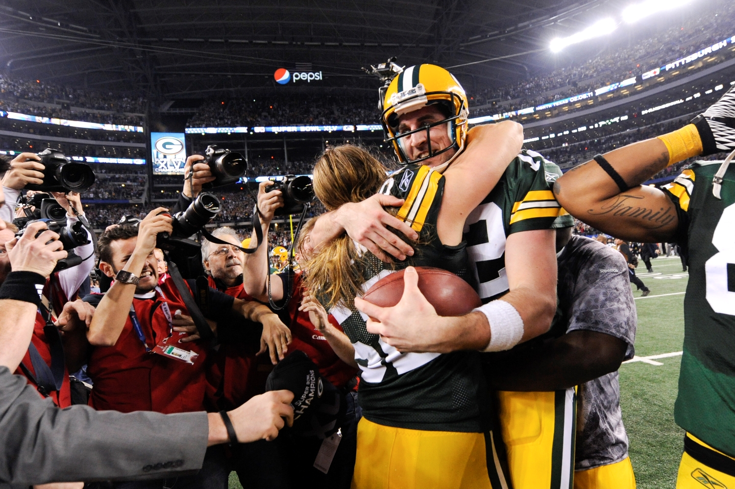Green Bay Packers quarterback Aaron Rodgers embraces Clay Matthews after defeating the Pittsburgh Steelers in Super Bowl 45.