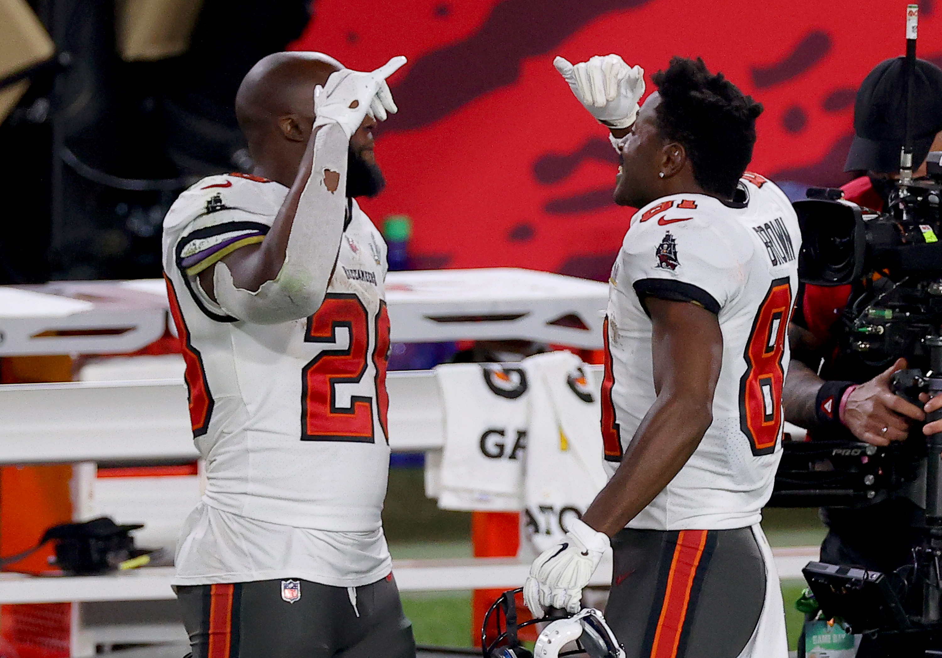 Antonio Brown and Leonard Fournette celebrate during their Super Bowl victory