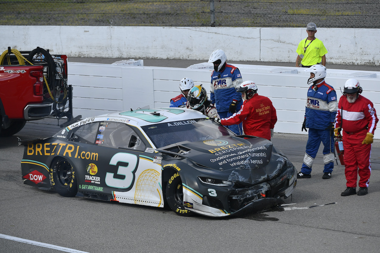 Austin Dillon gets out of car after accident