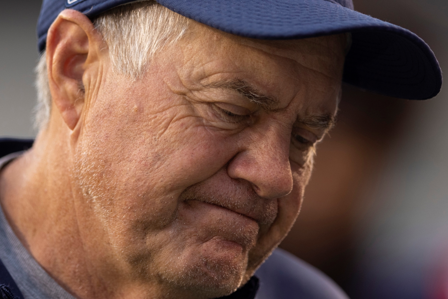 New England Patriots head coach Bill Belichick looking frustrated during a preseason game.