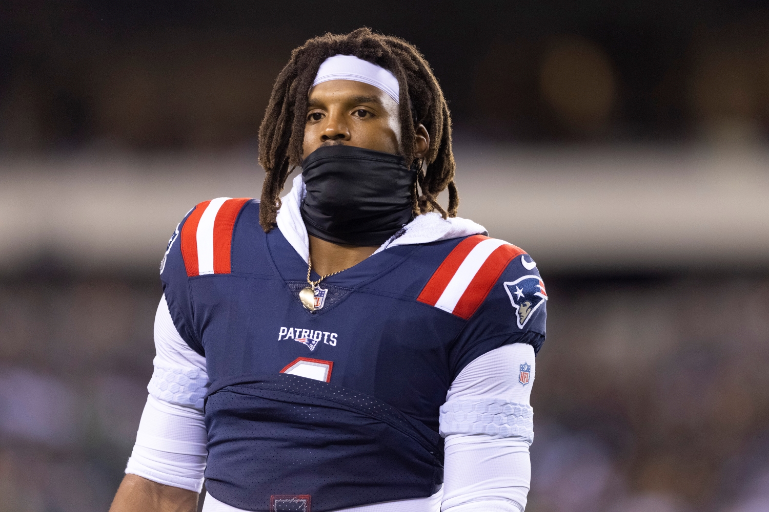 New England Patriots quarterback Cam Newton looks on during a preseason game against the Philadelphia Eagles.