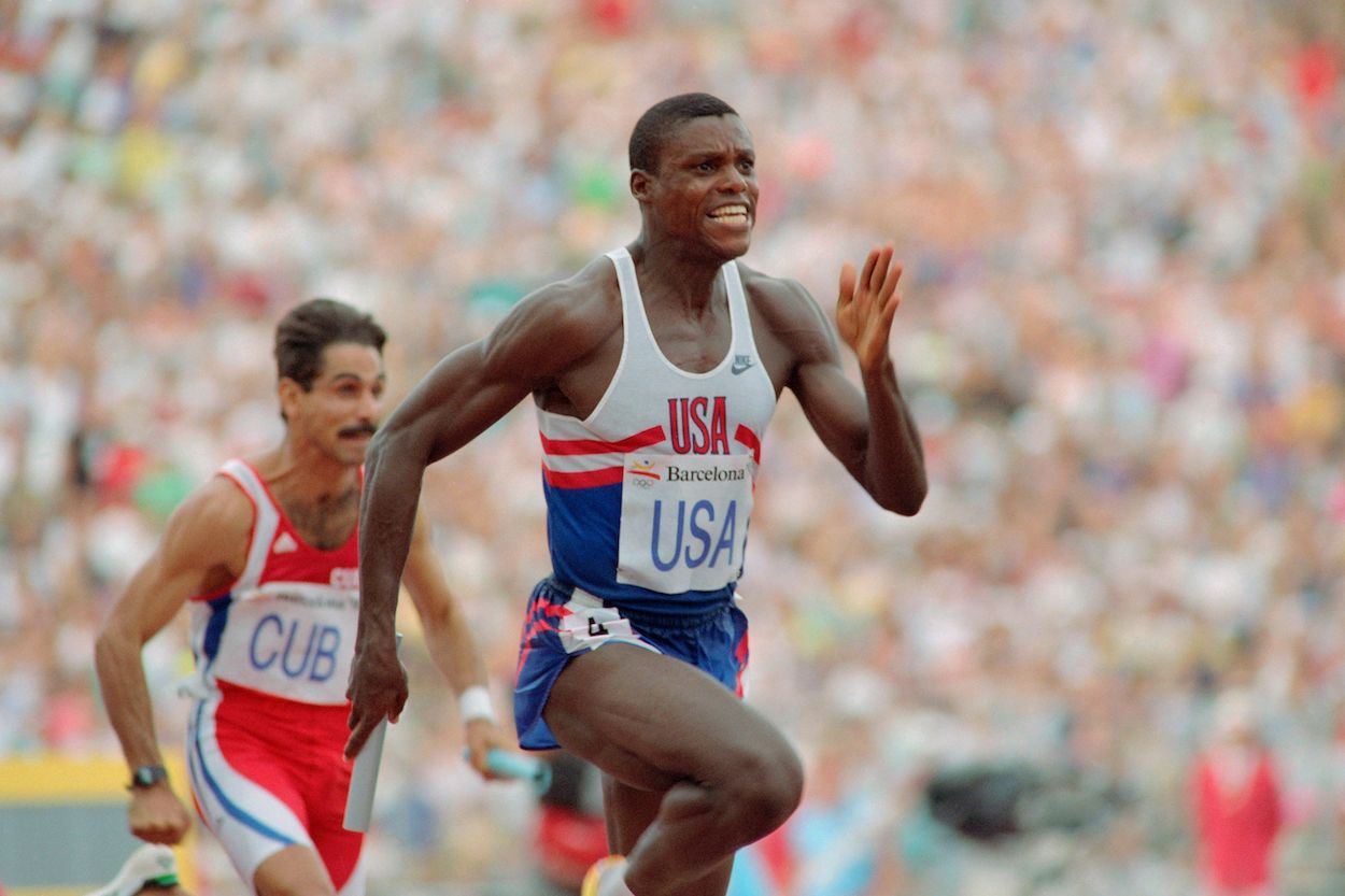 Carl Lewis of the USA runs the anchor leg in the final of the men's Olympic 4x100m relay, on August 08, 1992 in Barcelona. Lewis, along with teammates Dennis Mitchell, Mike Marsh and Leroy Burrell, won the gold medal in a world record time of 37.40 sec.