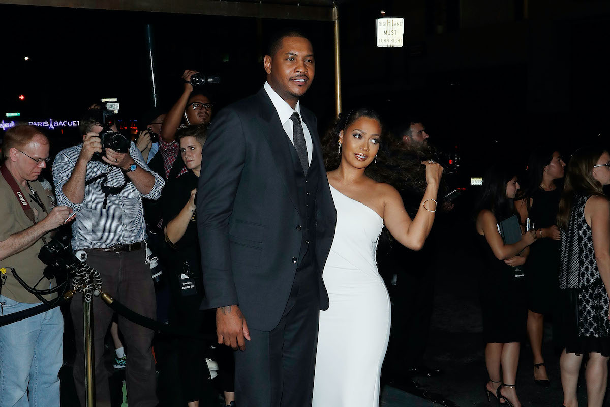Carmelo Anthony and La La Anthony attend a 2016 fashion show during New York Fashion Week