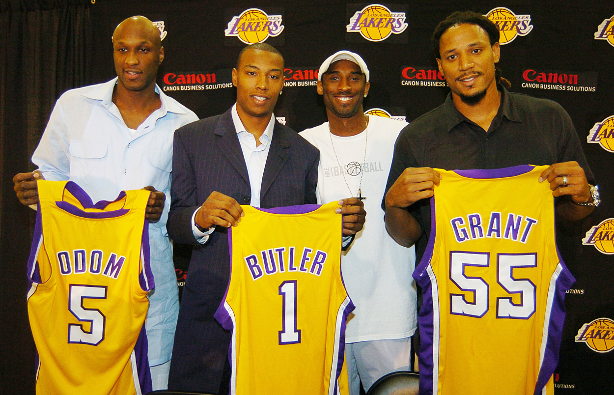Lamar Odom, Caron Butler, and Brian Grant with Lakers legend Kobe Bryant in 2004.