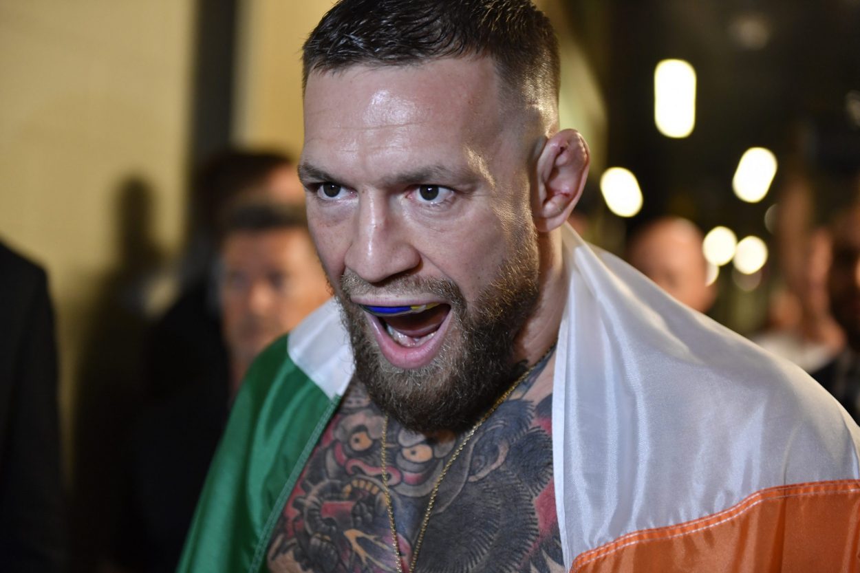 Conor McGregor prepares to enter the UFC Octagon ahead of his third fight with Dustin Poirier