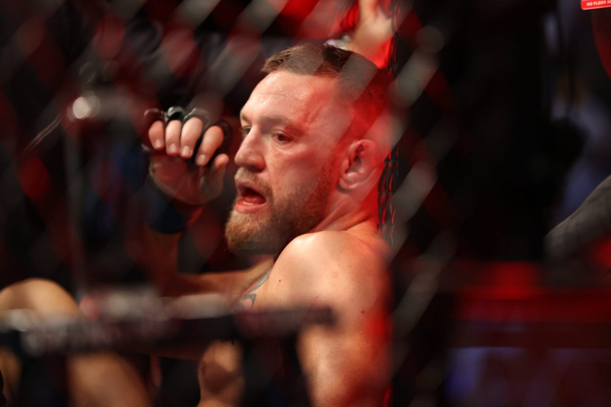 Conor McGregor reacts after his loss to Dustin Poirier at UFC 264