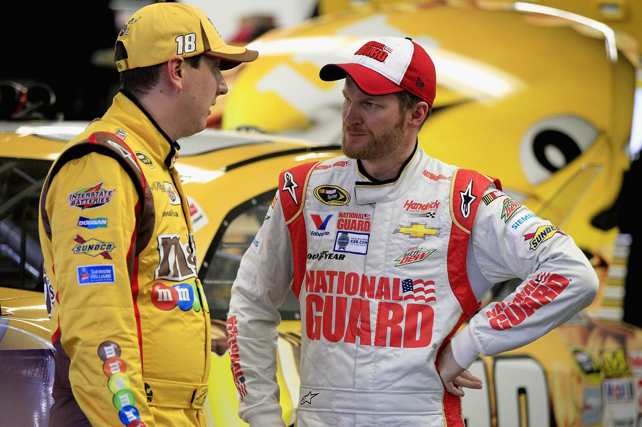 Dale Earnhardt Jr. speaks to Kyle Busch Before a NASCAR Cup Series race.