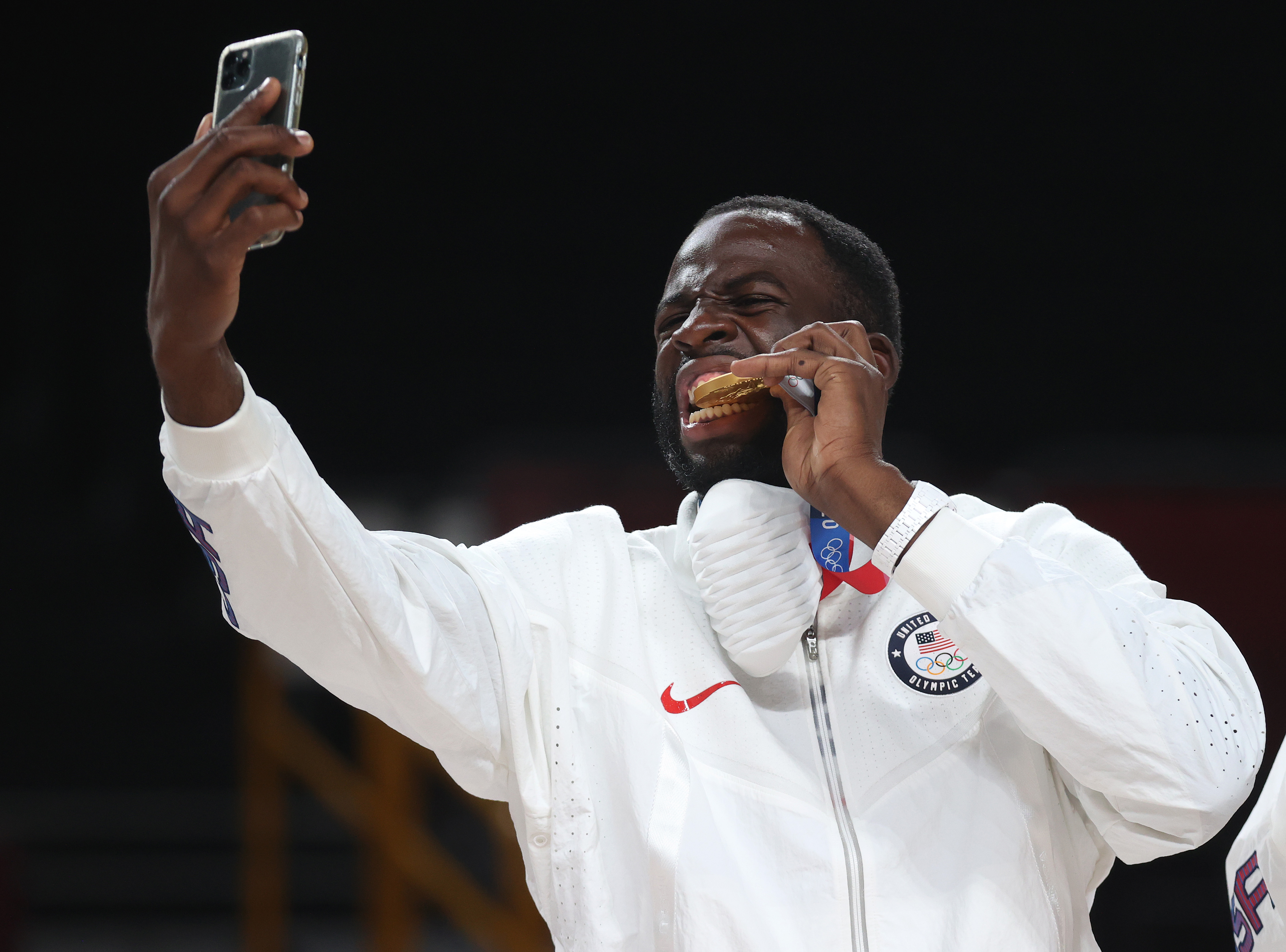 Warriors forward Draymond Green celebrates Team USA's victory over France in the gold medal game at the Olympics