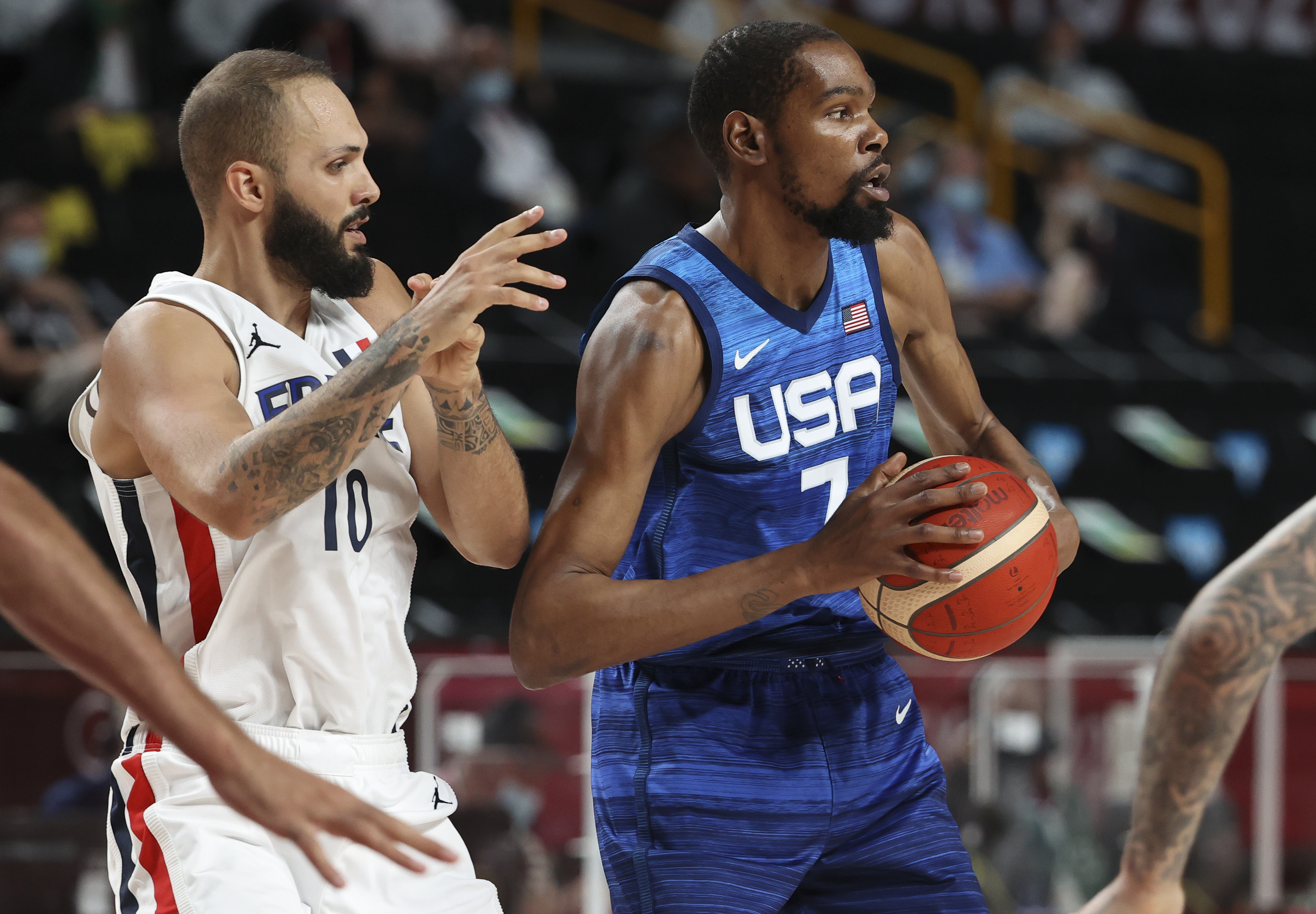 Evan Fournier guards Kevin Durant during the 2020 Tokyo Olympics