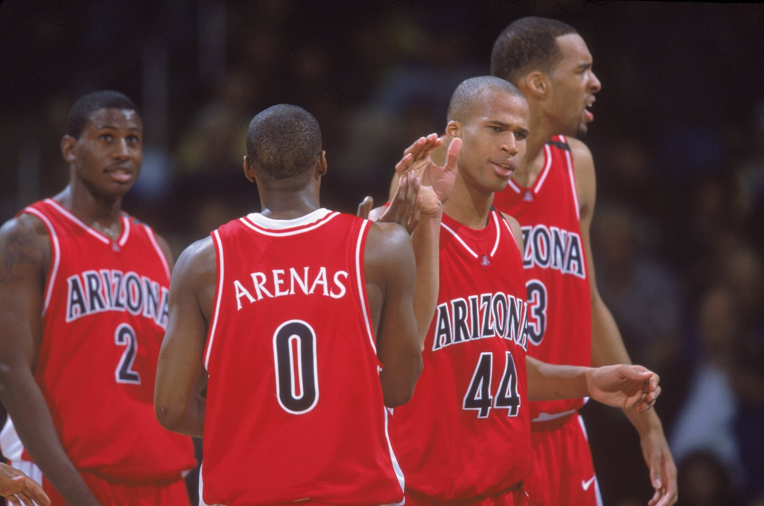 Gilbert Arenas (0) and Richard Jefferson (44) high five as members of the Arizona Wildcats.