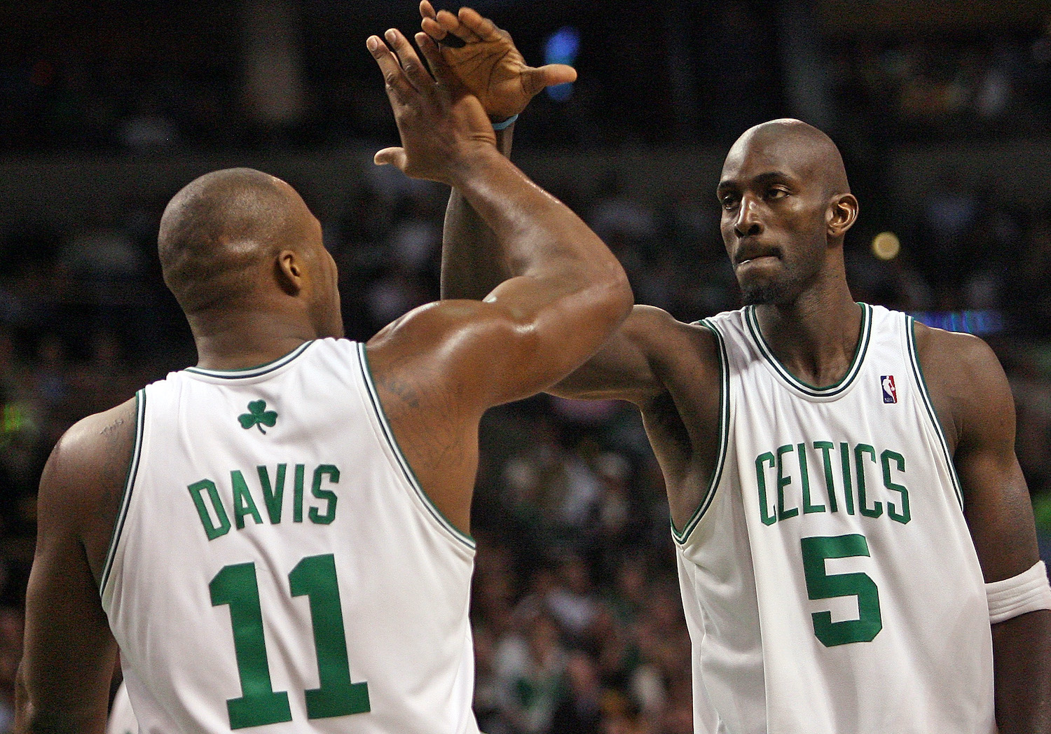 Boston Celtics big men Kevin Garnett and Glen 'Big Baby' Davis high five.