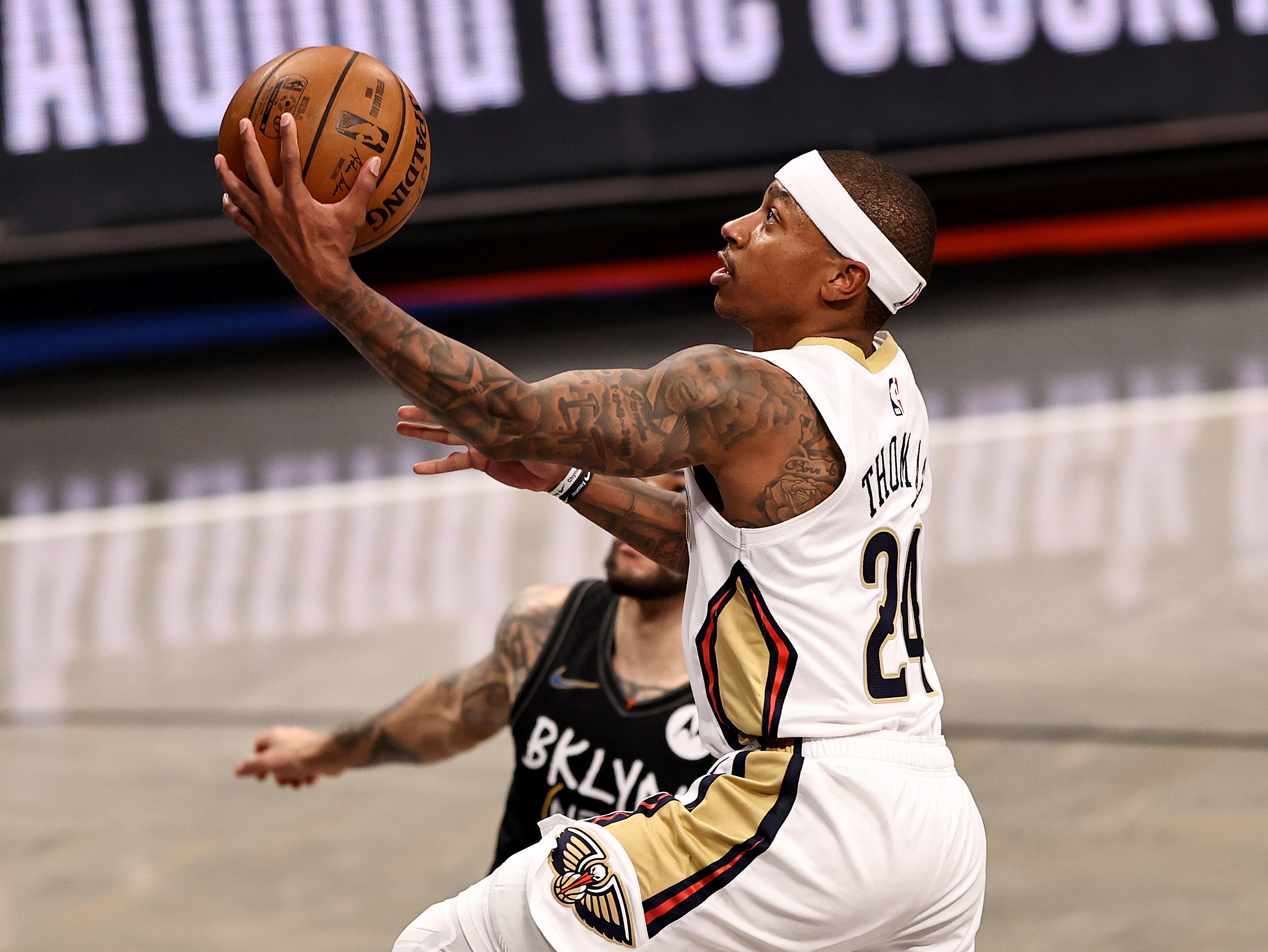 Current NBA free agent Isaiah Thomas drives to the basket during a game with the New Orleans Pelicans in April