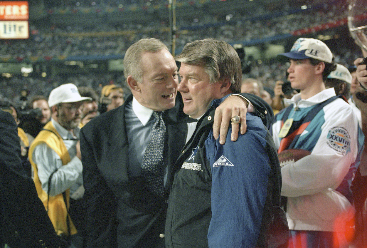 Dallas Cowboys owner Jerry Jones and coach Jimmy Johnson hug before winning Super Bowl