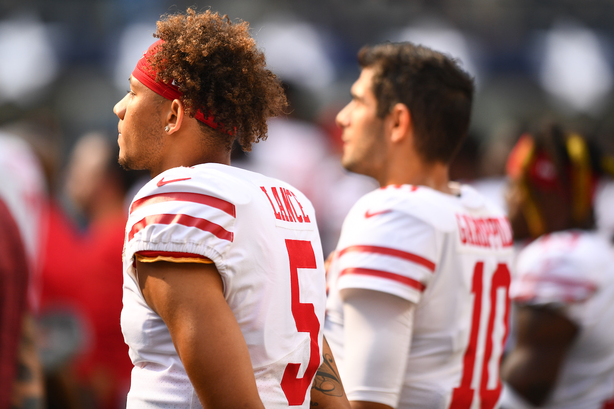 Jimmy Garoppolo and Trey Lance during a 49ers preseason game.