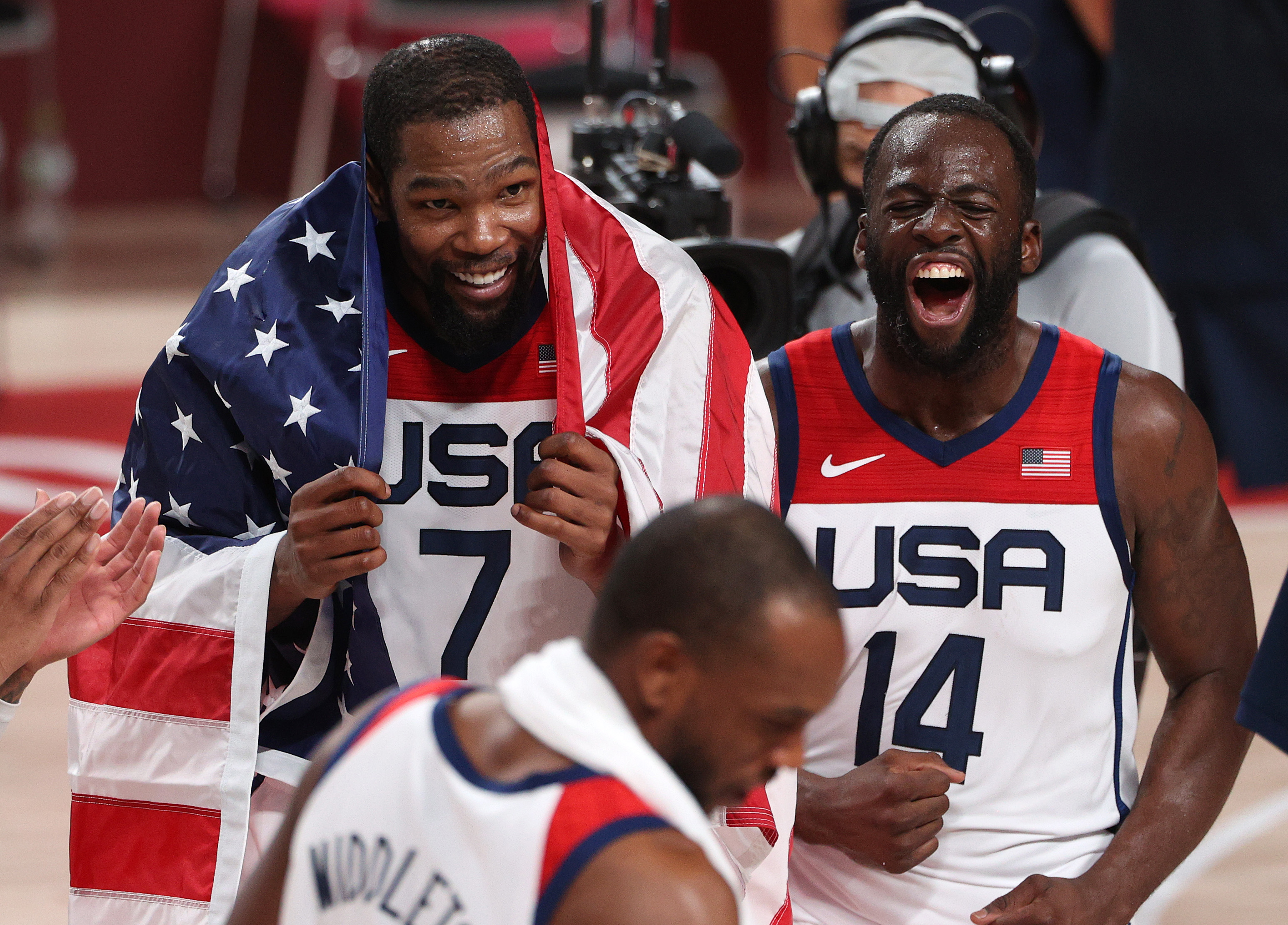 Kevin Durant and Draymond Green celebrate Team USA's victory in the gold medal game
