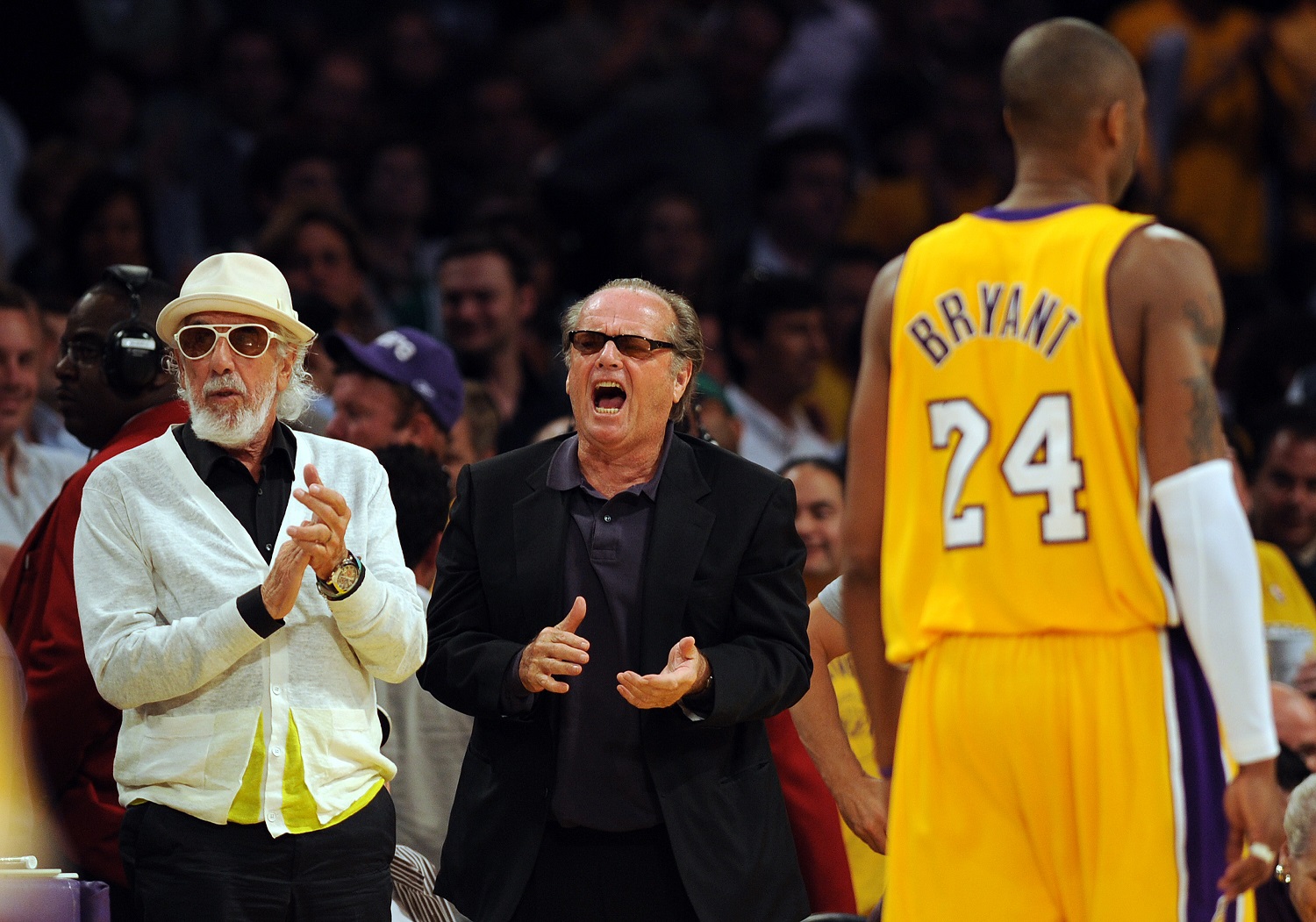 Record producer Lou Adler and actor Jack Nicholson cheer the Los Angeles Lakers' Kobe Bryant during Game 4 of the 2008 NBA Finals against the Boston Celtics in Los Angeles.