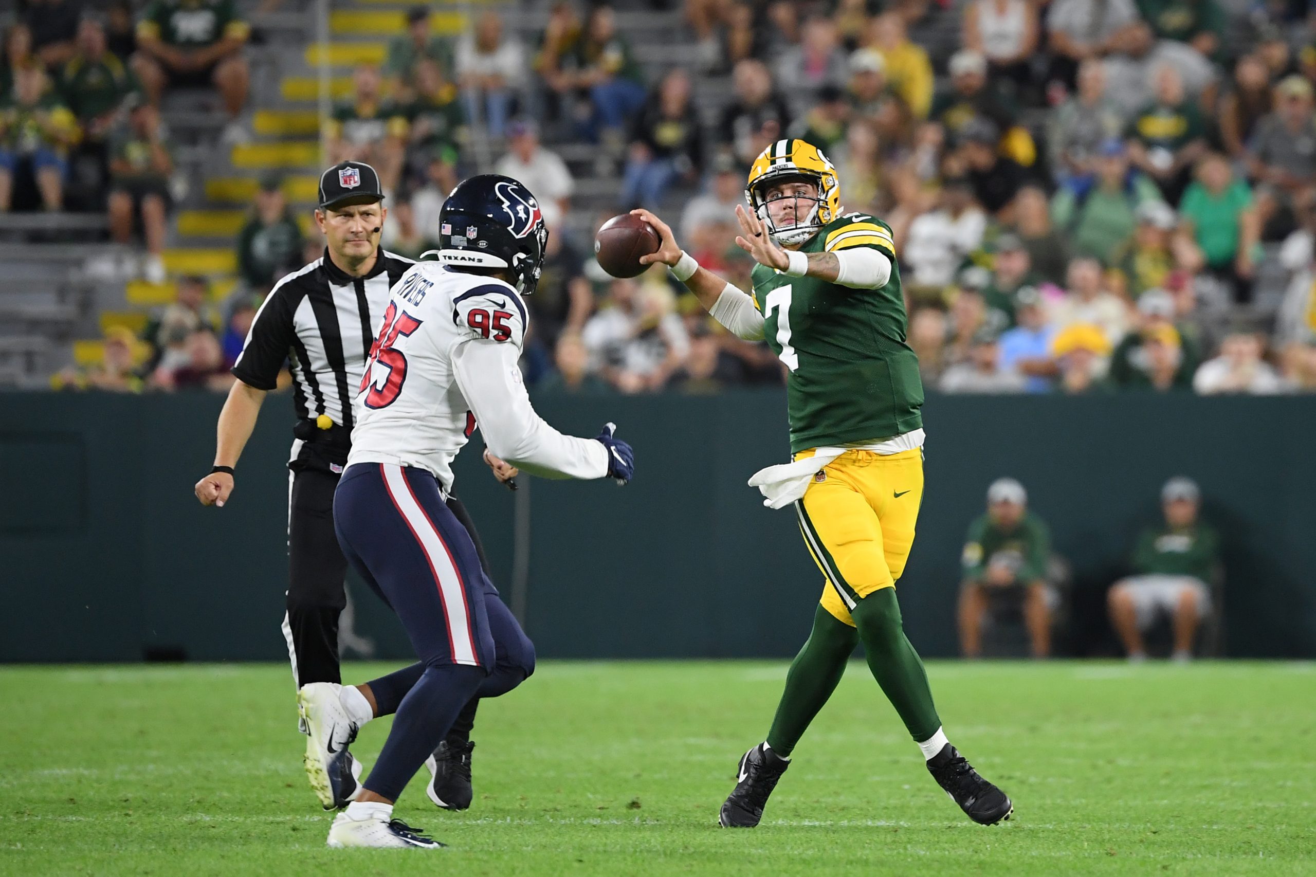 Kurt Benkert of the Green Bay Packers throws an interception in the second half of a preseason game.