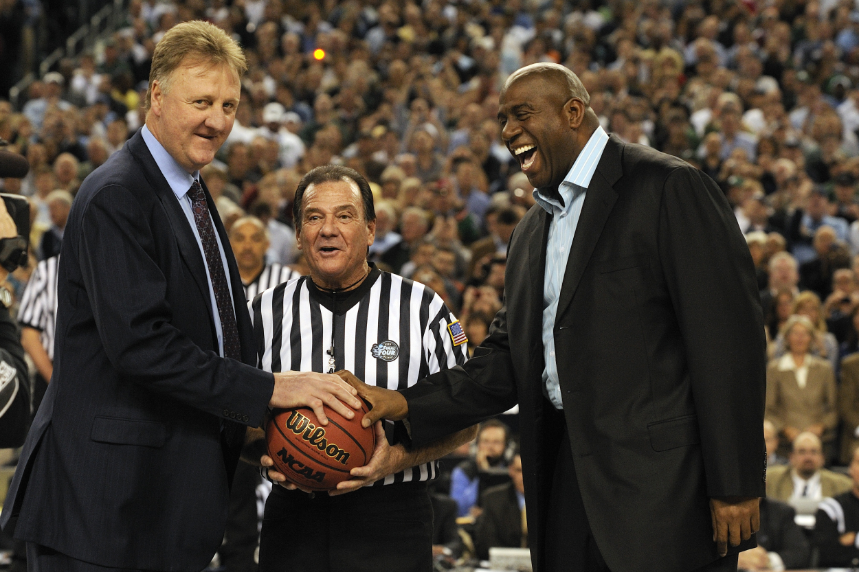 Larry Bird and Magic Johnson presented the game ball prior to the start of the game during the Division I Men's Final Four Basketball Championship Game in 2009.