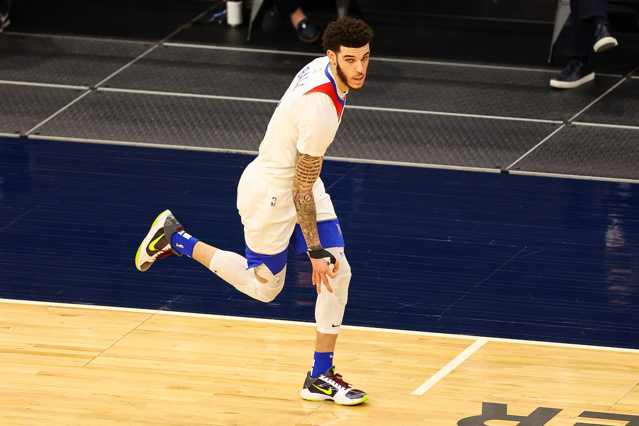 Lonzo Ball runs back on defense after making a three-pointer.