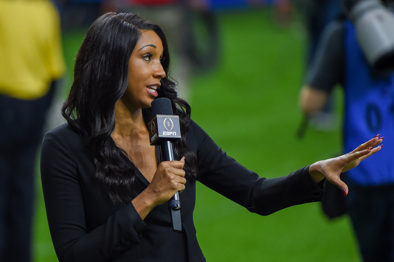 Analyst Maria Taylor reports from the sideline during the Allstate Sugar Bowl College Football Playoff semifinal between Ohio State and Clemson.