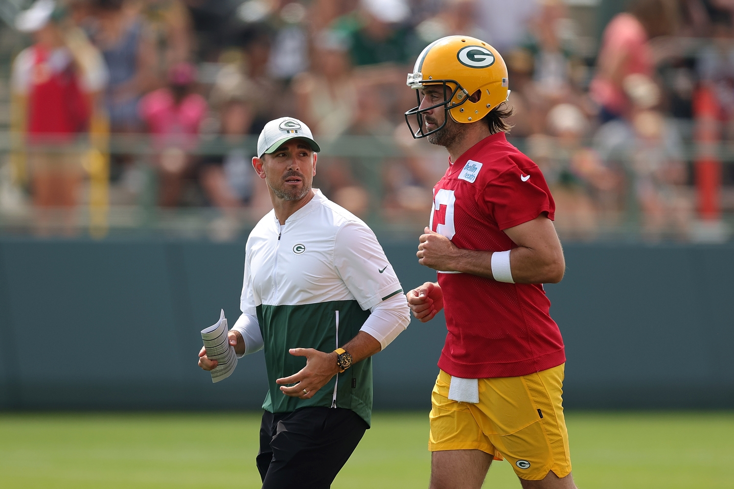 Green Bay Packers head coach Matt LaFleur and Aaron Rodgers speak during training camp.