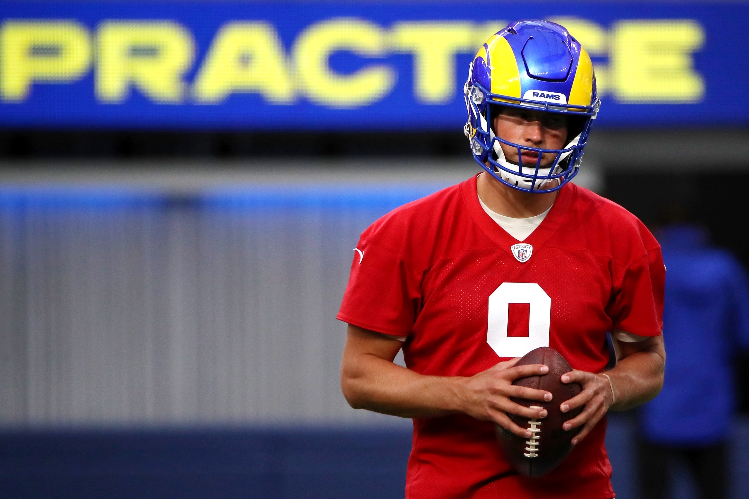 Los Angeles Rams quarterback Matthew Stafford holds the ball during practice.