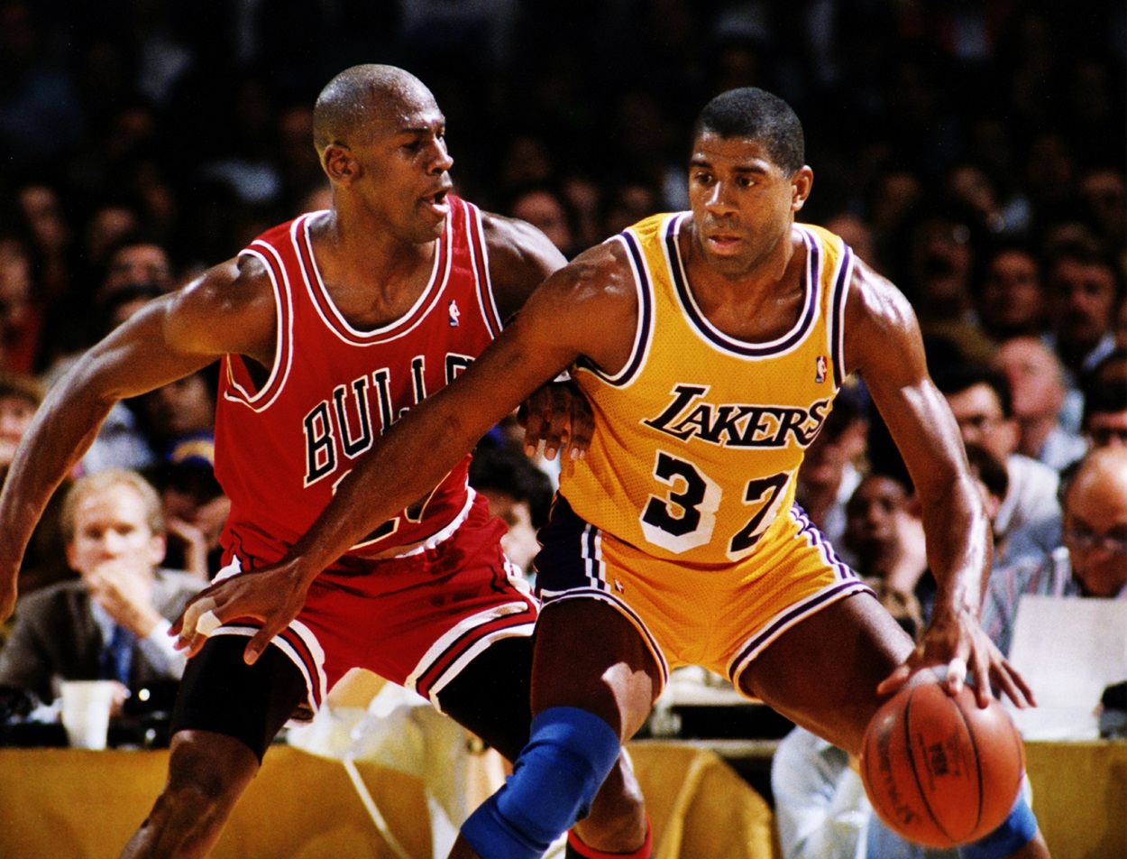 Michael Jordan and Magic Johnson battle during the 1991 NBA Finals between the Chicago Bulls and Los Angeles Lakers