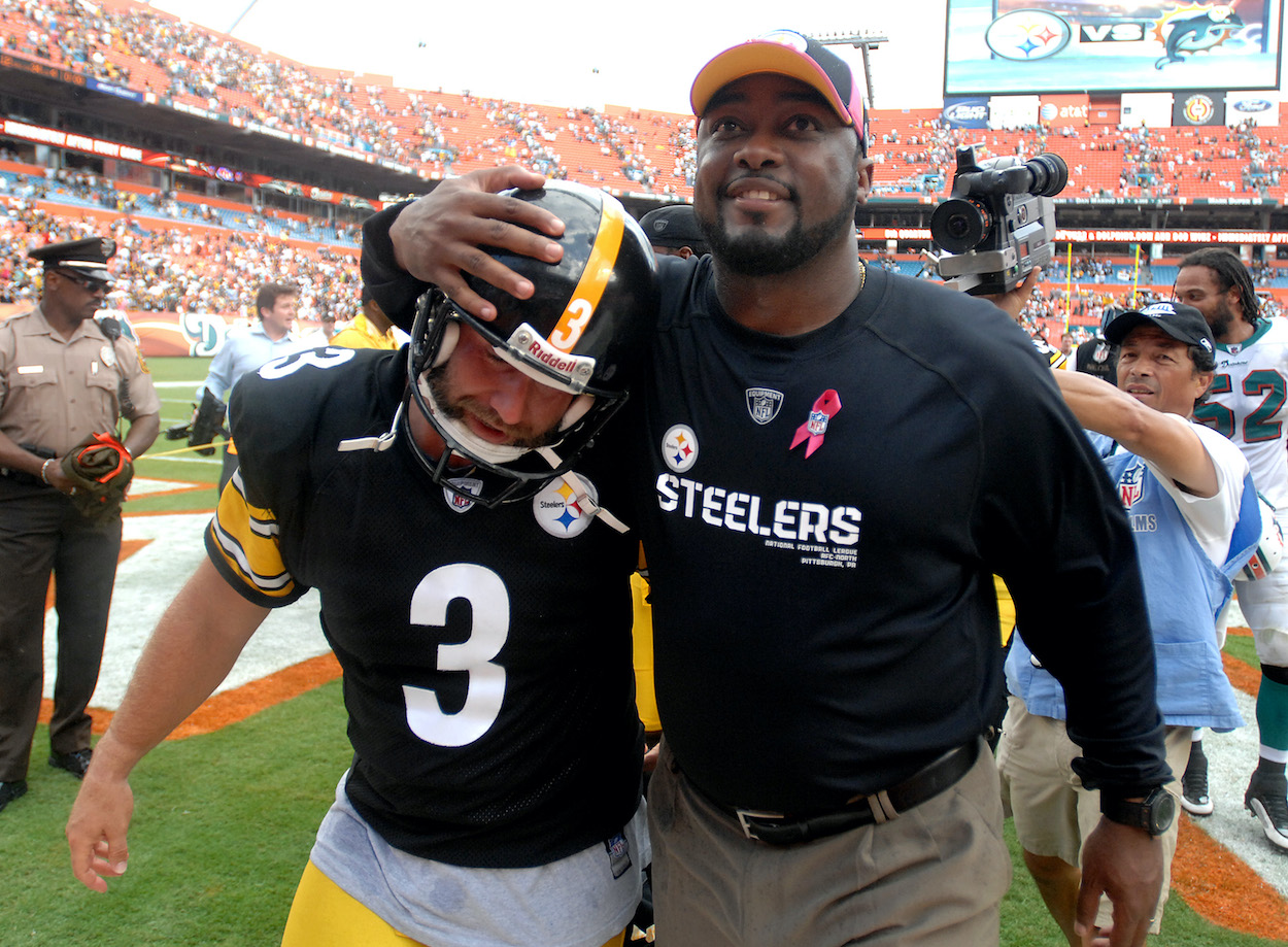 Pittsburgh Steelers head coach Mike Tomlin hugs kicker Jeff Reed who made a late field goal against the Miami Dolphins. The Steelers defeated the Dolphins, 23-22, at Sun Life Stadium in Miami Gardens, Florida, Sunday, October 24, 2010.