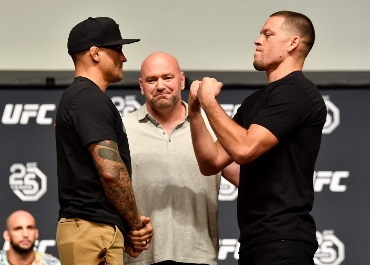 Nate Diaz and Dustin Poirier square off at a UFC press conference in 2018