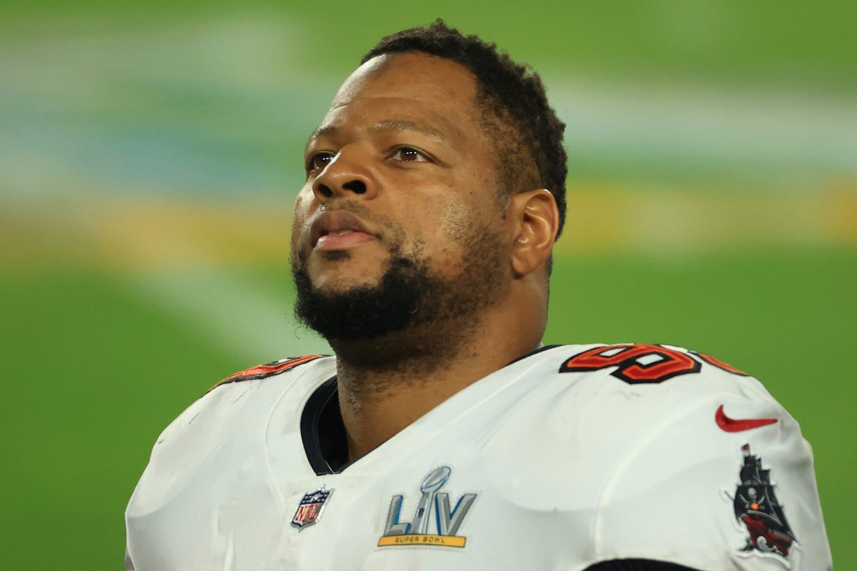Buccaneers defensive lineman Ndamukong Suh looks on during the Super Bowl