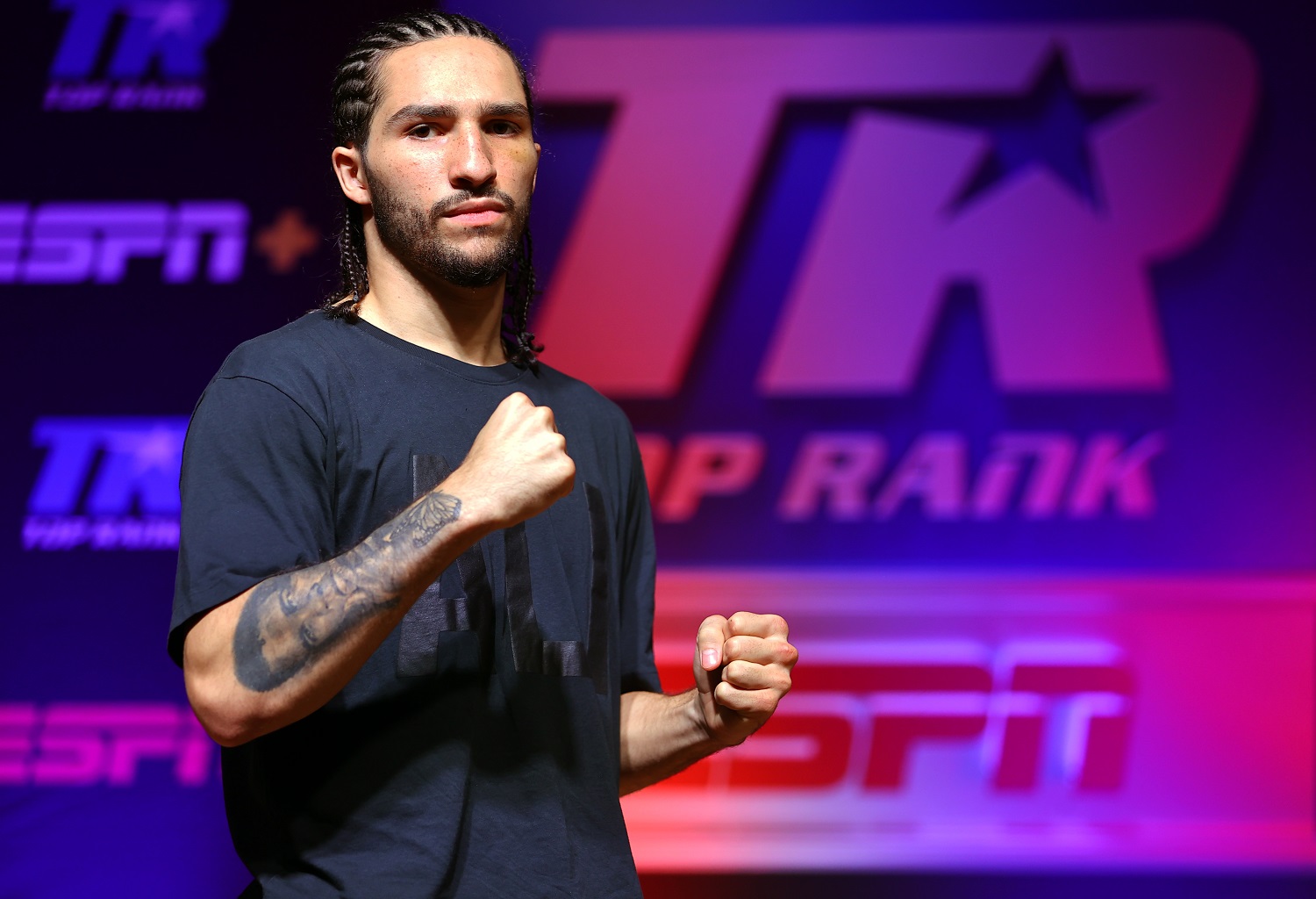 Nico Ali Walsh poses during the press conference in Catoosa, Oklahoma, promoting his professional boxing debut. | Mikey Williams/Top Rank Inc via Getty Images