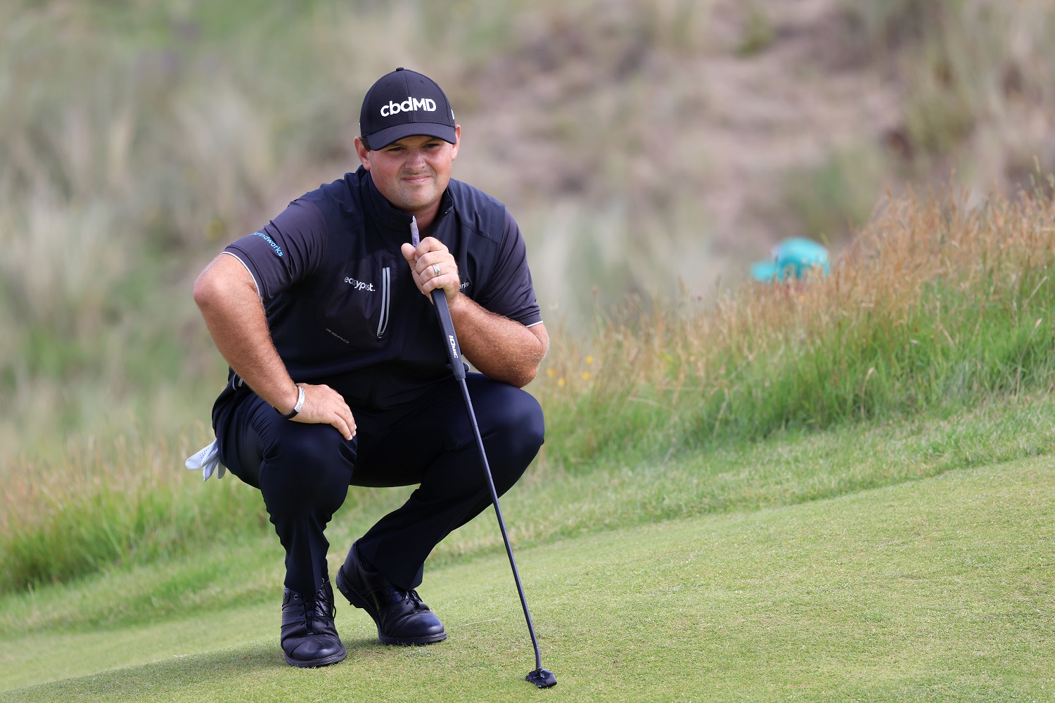 Patrick Reed of the United States lines up a putt on the third hole during the second round of the British Open at Royal St George’s Golf Club on July 16, 2021, in Sandwich, England. | Chris Trotman/Getty Images