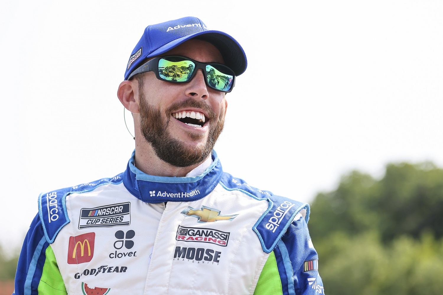 Ross Chastain laughs on the grid during qualifying for the NASCAR Cup Series race at Road America on July 4, 2021.
