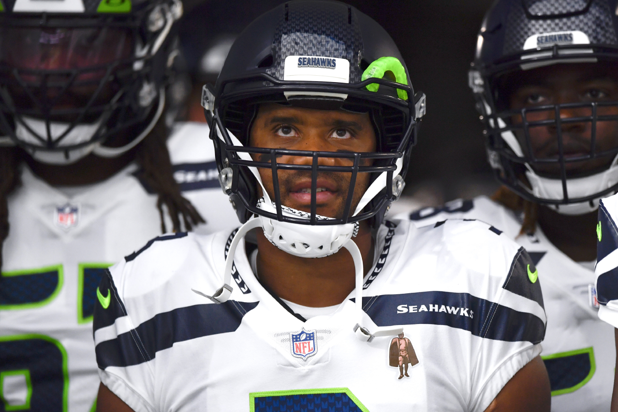 Quarterback Russell Wilson of the Seattle Seahawks prepares to take the field during a preseason game against the Las Vegas Raiders .