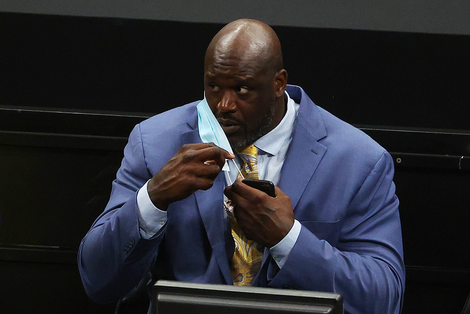 Shaquille O'Neal looks on from press row before Game 6 of the Eastern Conference finals between the Milwaukee Bucks and Atlanta Hawks on July 3, 2021.