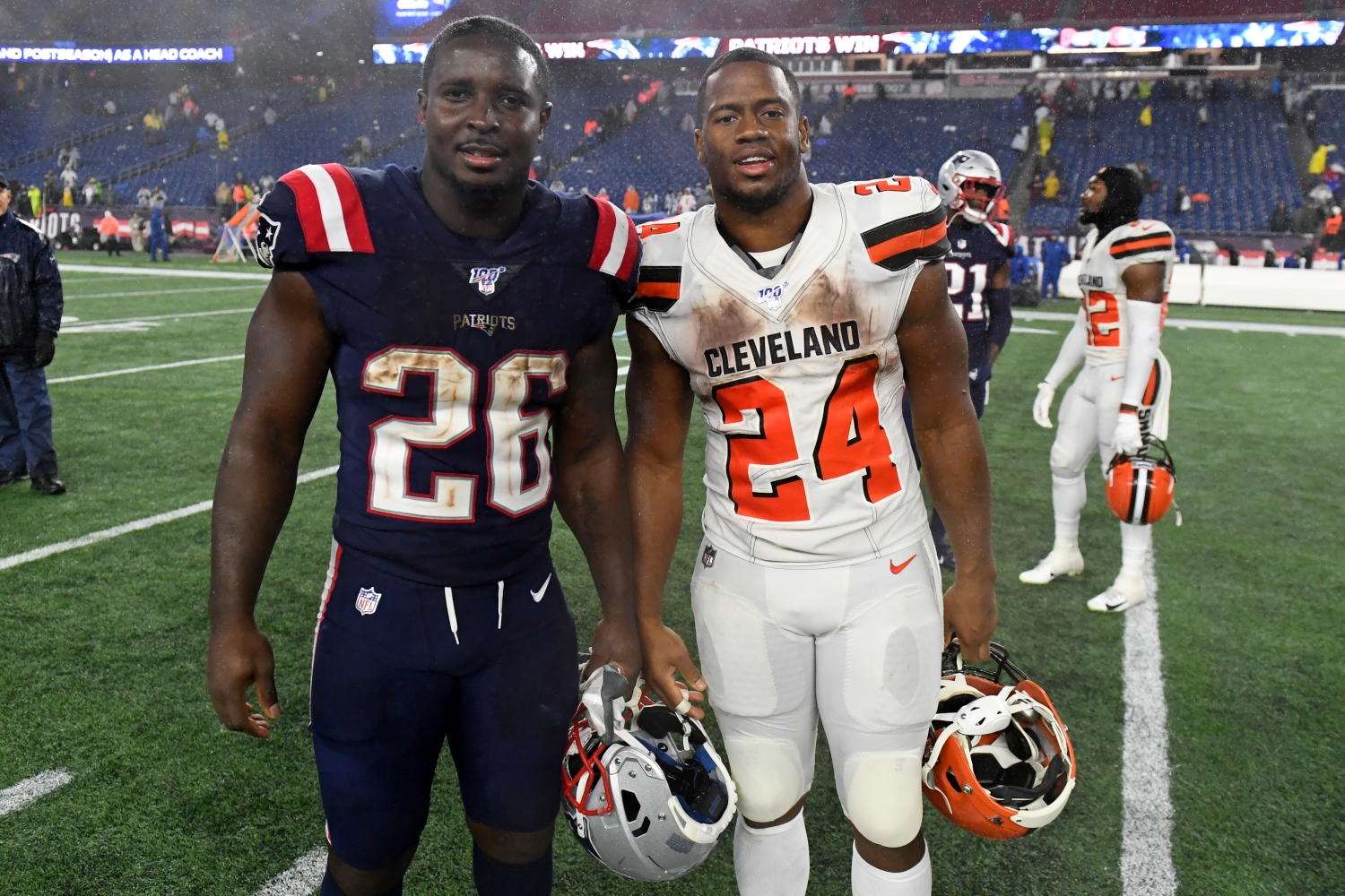 New England Patriots running back Sony Michel stands next to Cleveland Browns star and college teammate Nick Chubb after a game.