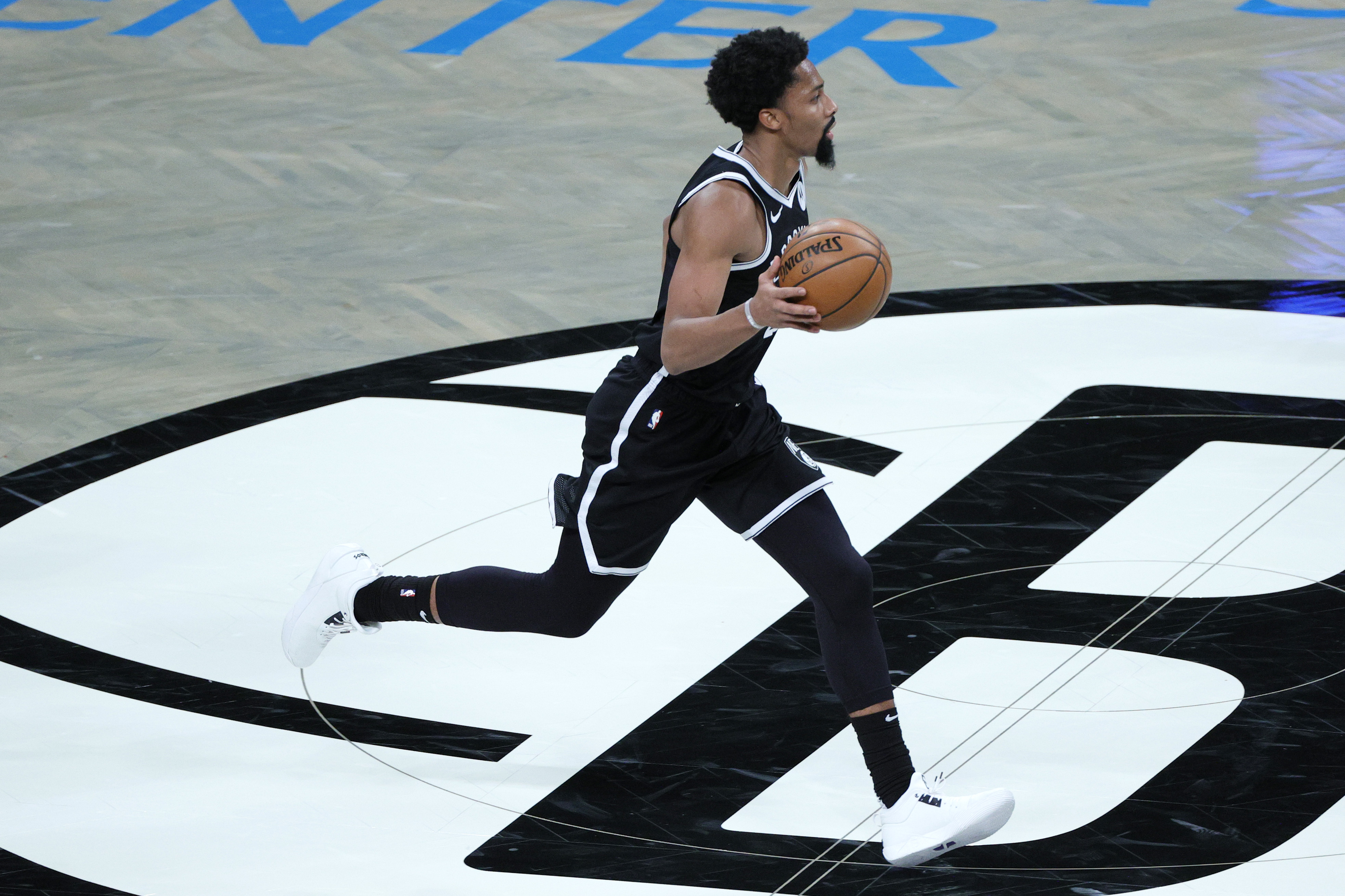 Former Nets star and now Wizards guardSpencer Dinwiddie dribbles up the floor during NBA Opening Night last December