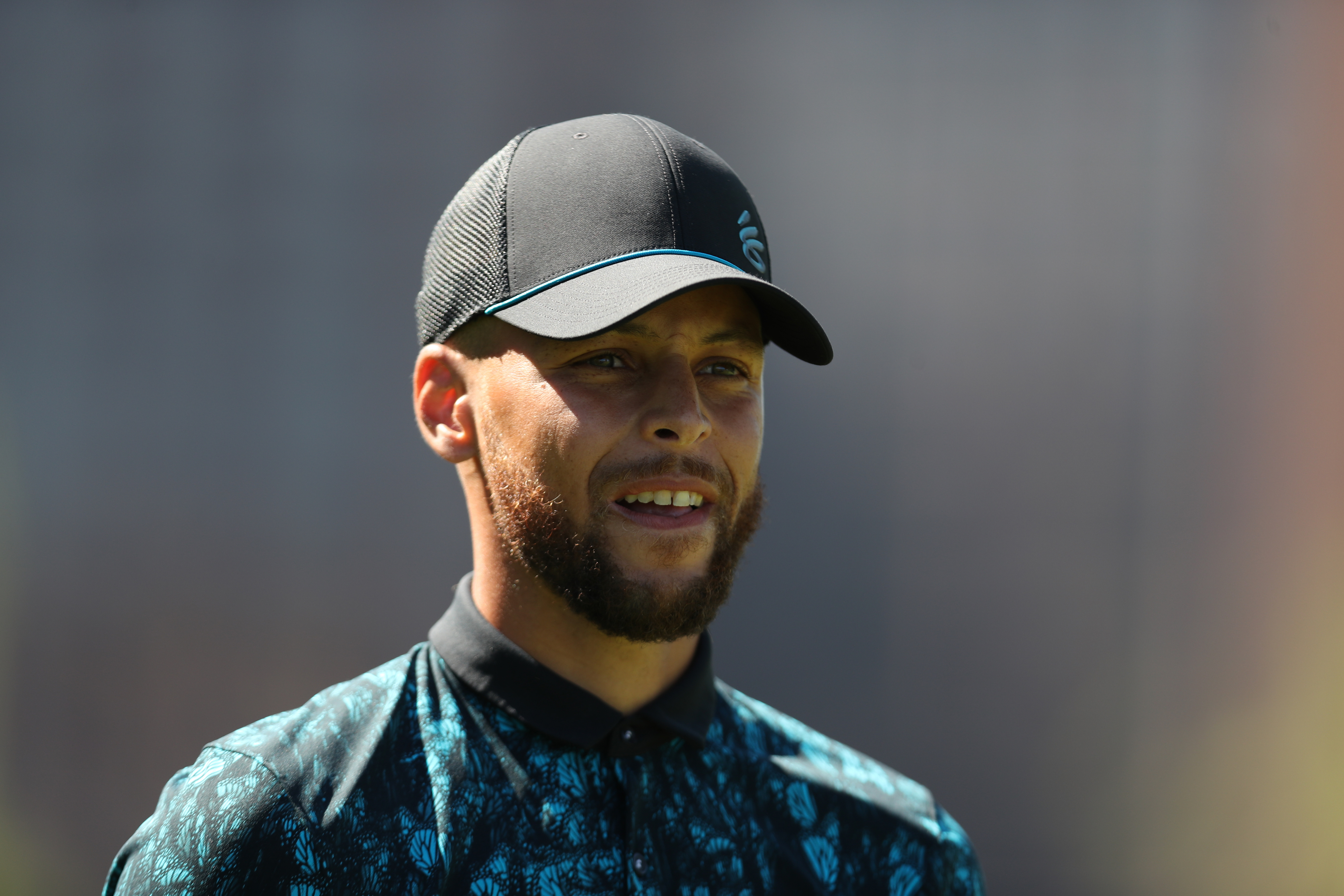 Warriors star Stephen Curry looks on during the American Century Championship